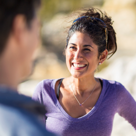 A woman smiling knowing she is protected with universal life insurance.