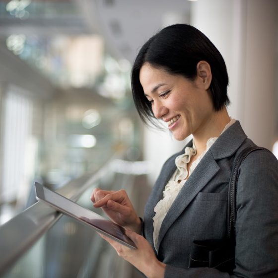 A financial professional using a tablet to run illustrations for Protective products.