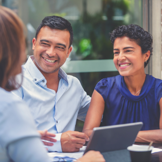 Financial professional discussing life insurance and protection solutions with a client.