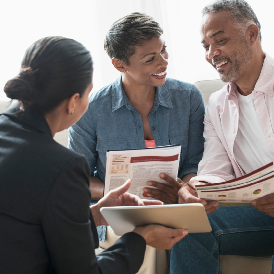 Financial advisor going over details of Protective Aspirations variable annuity solutions with clients.