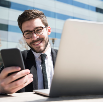 A financial professional submitting an electronic life insurance application through his cell phone.