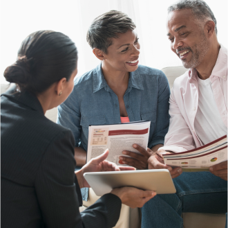 Financial professional going over details of Protective Aspirations variable annuity solutions with clients.