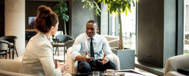 Financial professional and client discussing retirement planning basics, options and Protective fixed annuities