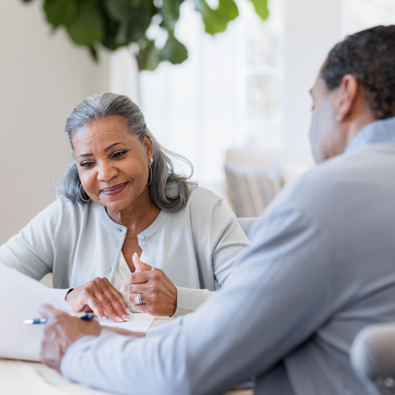 A woman reviewing Protective Smart Saver NY with her financial advisor.