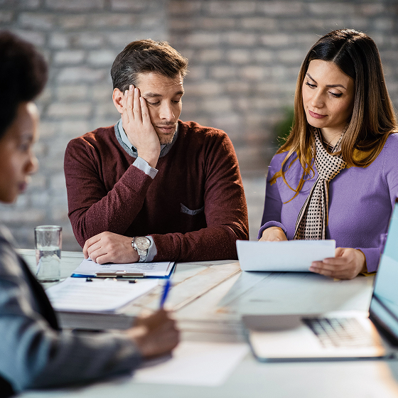 Couple reviewing a life insurance needs analysis.