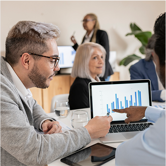 Financial professional reviewing a Protective Aspirations variable annuity fund performance report.
